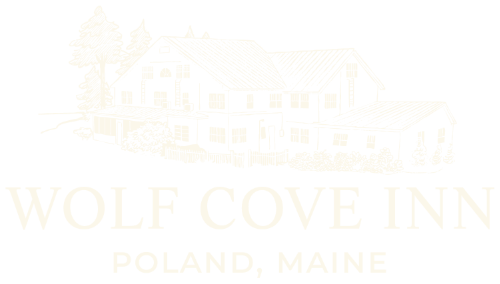 Illustration of Wolf Cove Inn in Poland, Maine, featuring a rustic building and trees.